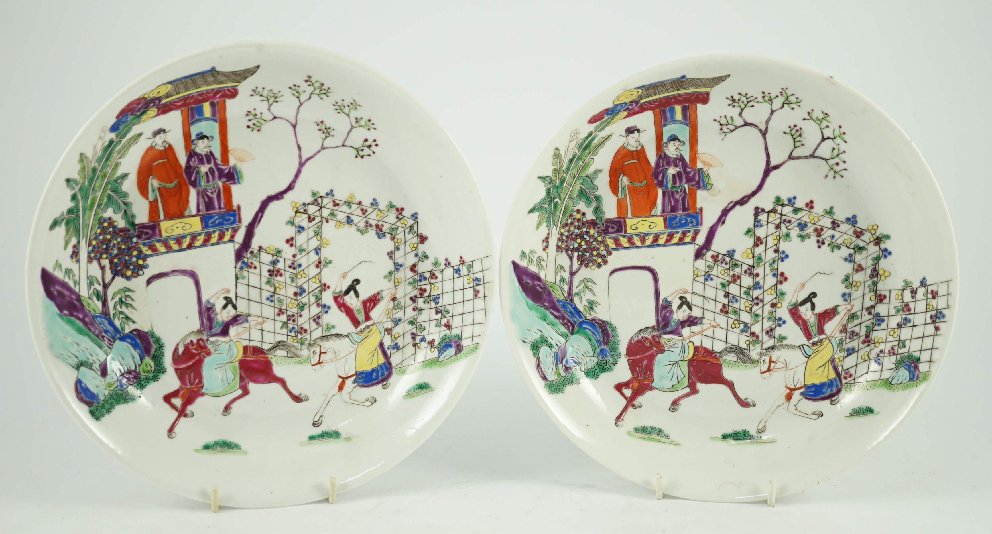 Two Chinese famille rose fencai saucer dishes, Yongzheng marks but 19th century, 23.7cm diameter